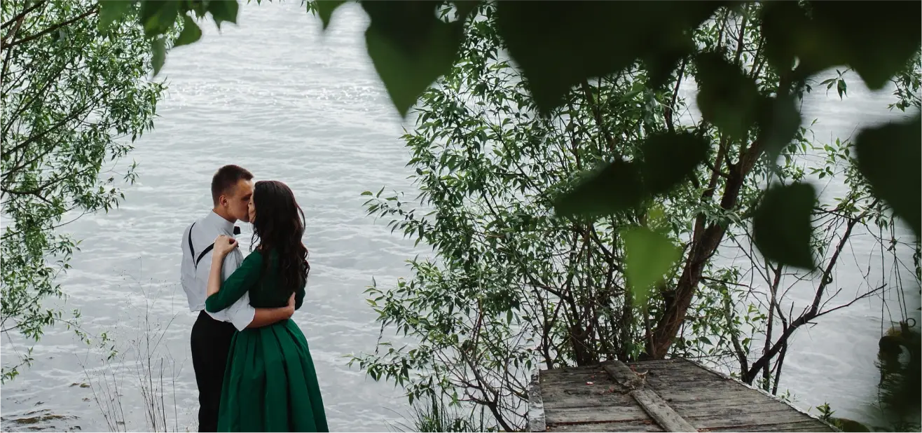 kissing couple at the waterfront