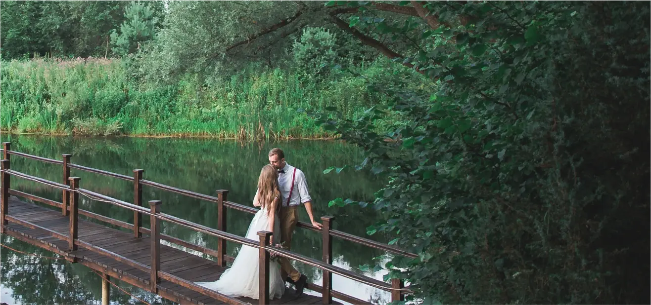 Bride Groom on the bridge on lake